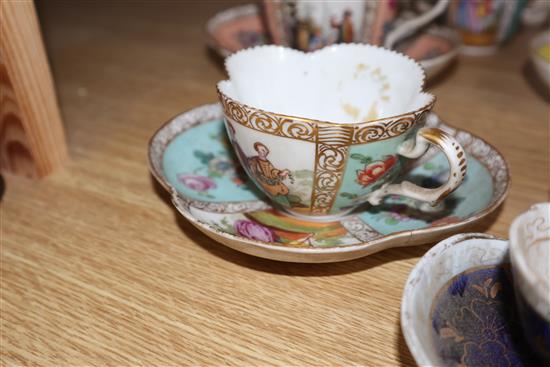 A group of Dresden cup saucers and covers, a Russian tea cup and other Continental porcelain cups